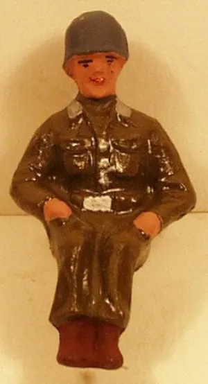 Arnold Hauser Toy Soldier  green seated 58mm