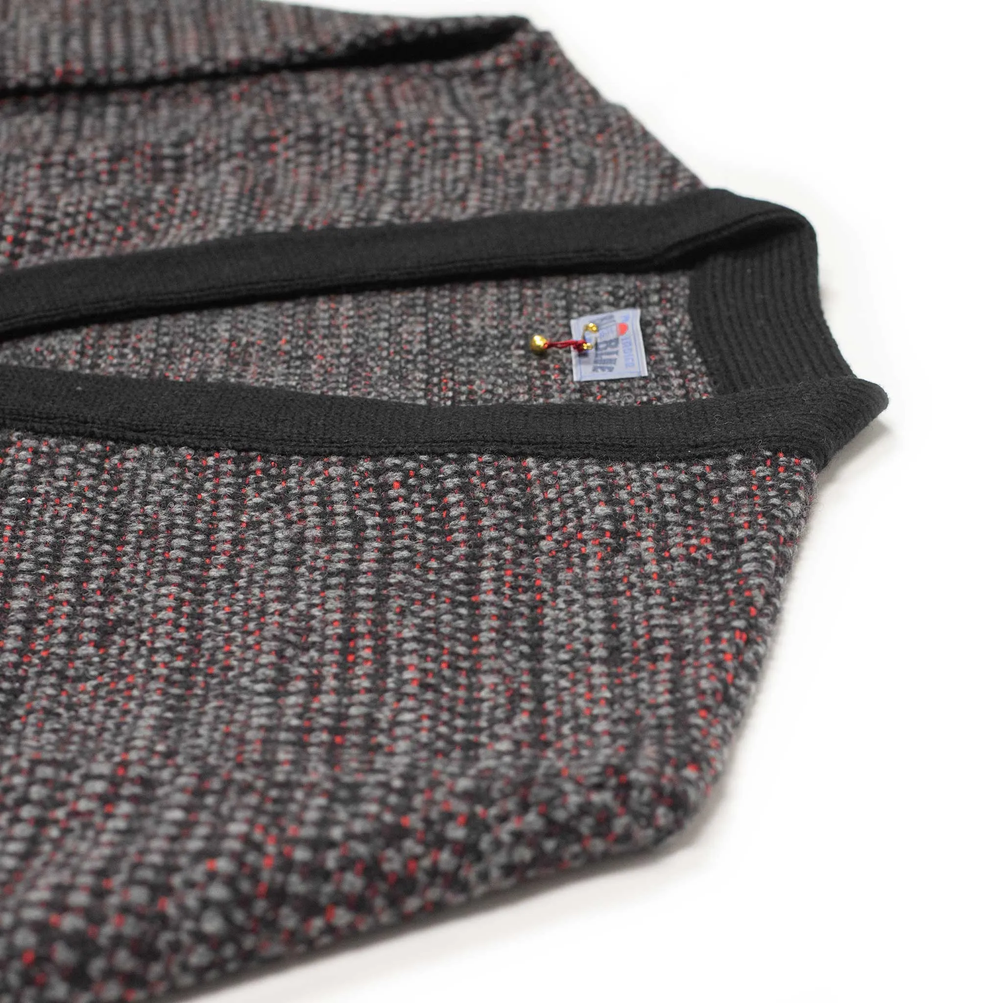 V-neck cardigan in black, grey, and crimson wool mix