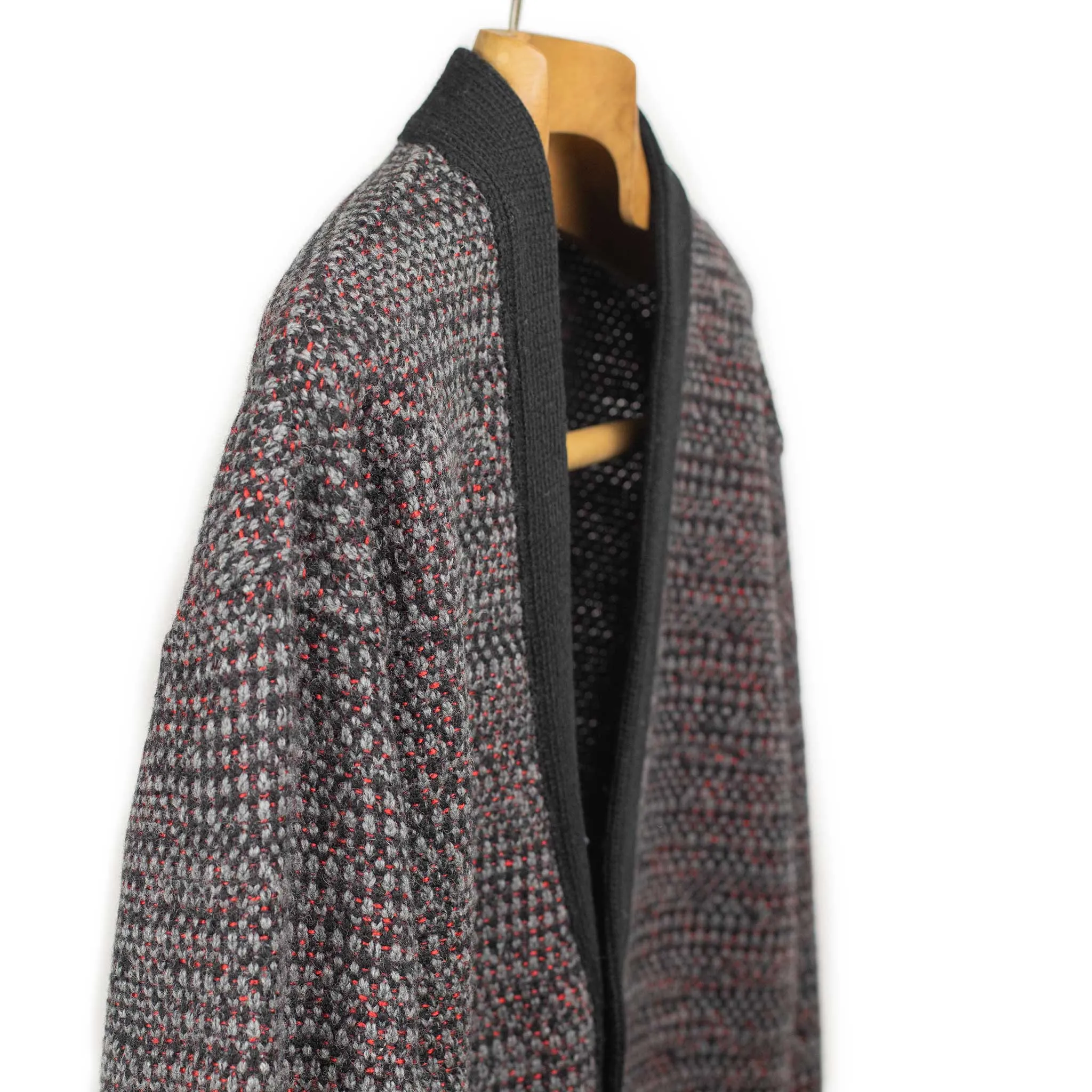 V-neck cardigan in black, grey, and crimson wool mix